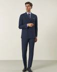 Blue double-breasted suit with peak lapels and custom-fit stretch fabric