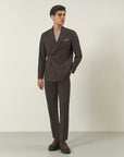 Brown double-breasted suit with peak lapels and slim fit stretch fabric