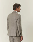 Beige pinstriped suit with peak lapels, custom fit, flannel wool