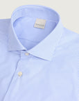 Light blue and white striped shirt in performance fabric, custom fit