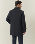 Blue waterproof technical coat with detachable bib