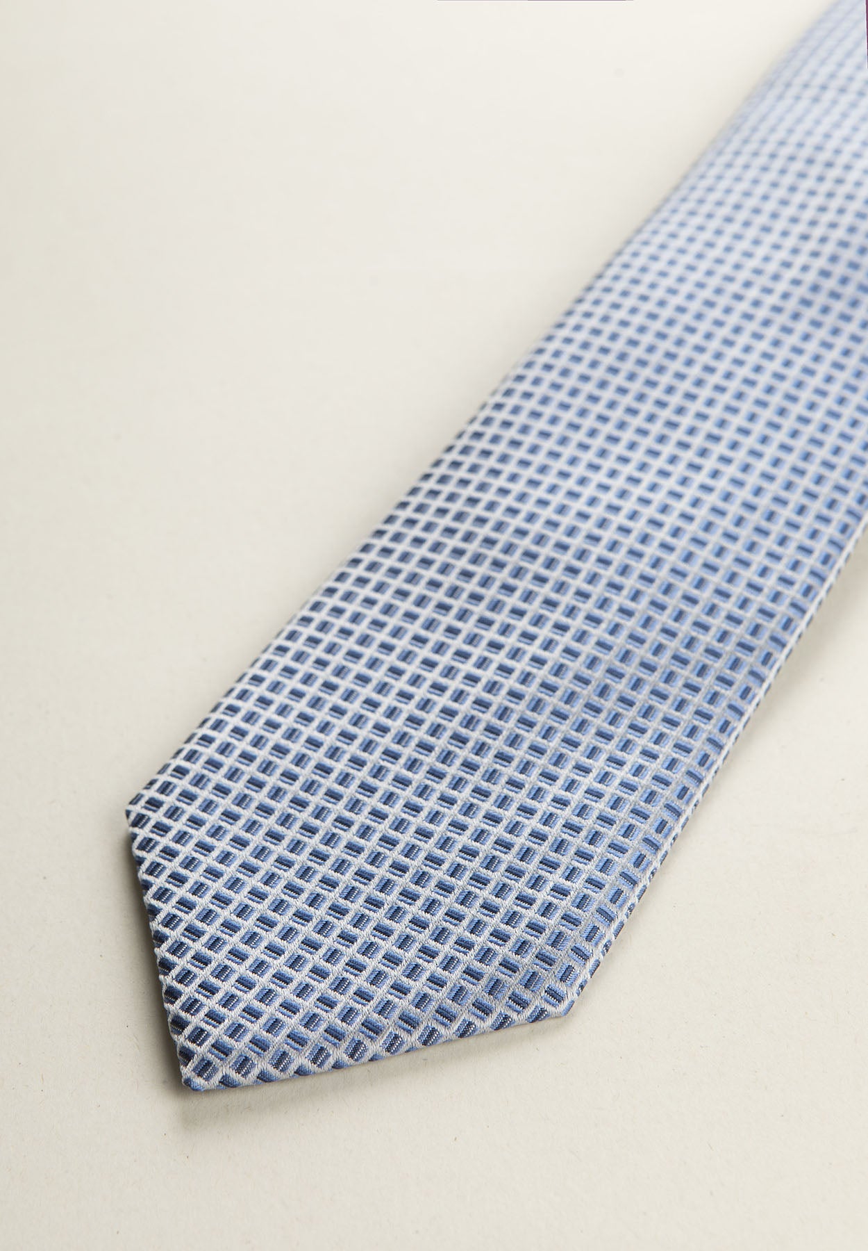 Light Blue Tie With A Micro-Design Of Blue And White Silk