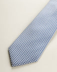 Light Blue Tie With A Micro-Design Of Blue And White Silk