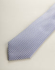Wisteria Tie With A Blue And White Micro-Pattern In Silk