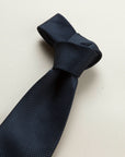 Navy blue silk tie