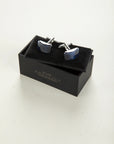 Curved blue stone cufflink