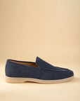 Blue suede slip-on loafers