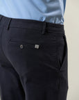 Blue chino trousers in stretch cotton with custom fit weave