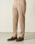 Beige trousers with half-elastic pleats