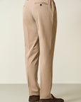 Beige trousers with half-elastic pleats