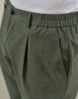 Sage green trousers with half-elastic pleats
