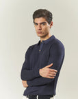 Blue wool polo shirt with acid-etched effect