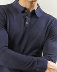 Blue wool polo shirt with acid-etched effect