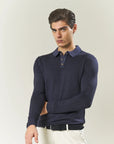 Blue wool polo shirt with acid-etched effect