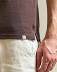 Dark brown polo shirt in slub cotton pique