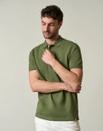 Green polo shirt in slub cotton pique