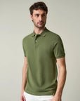 Green polo shirt in slub cotton pique