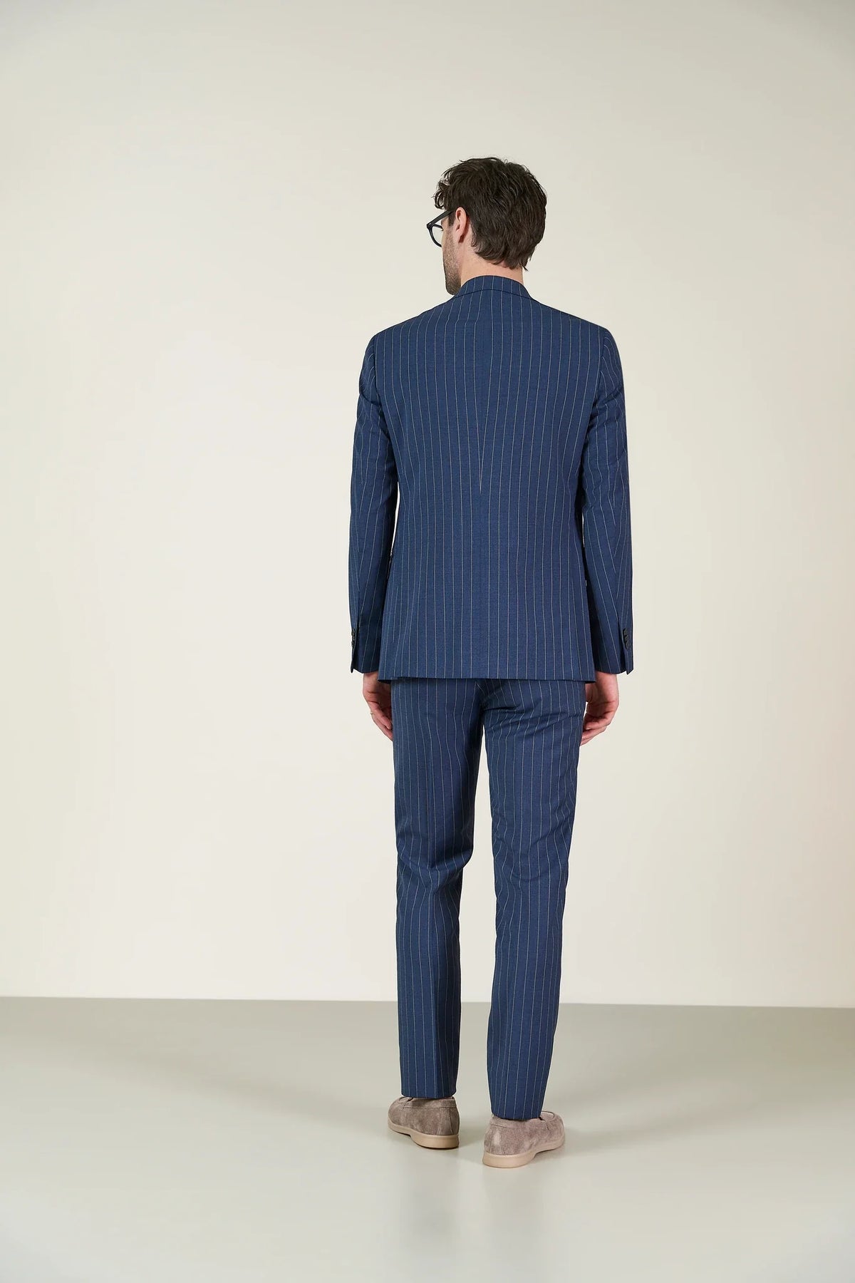 Custom fit blue pinstriped wool canvas suit