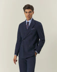 Blue double-breasted suit with peak lapels and custom-fit stretch fabric