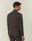 Brown double-breasted suit with peak lapels and slim fit stretch fabric