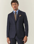 Blue pinstriped suit with peak lapels in custom-fit virgin wool flannel