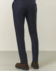 Blue pinstriped suit with peak lapels in custom-fit virgin wool flannel