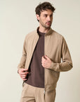 Beige bomber jacket in unlined technical fabric