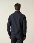 Unlined blue technical fabric bomber jacket