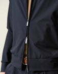 Unlined blue technical fabric bomber jacket