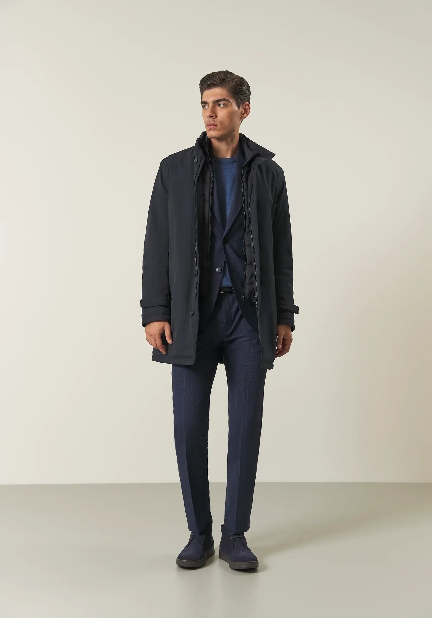 Blue waterproof technical coat with detachable bib