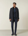 Blue waterproof technical coat with detachable bib