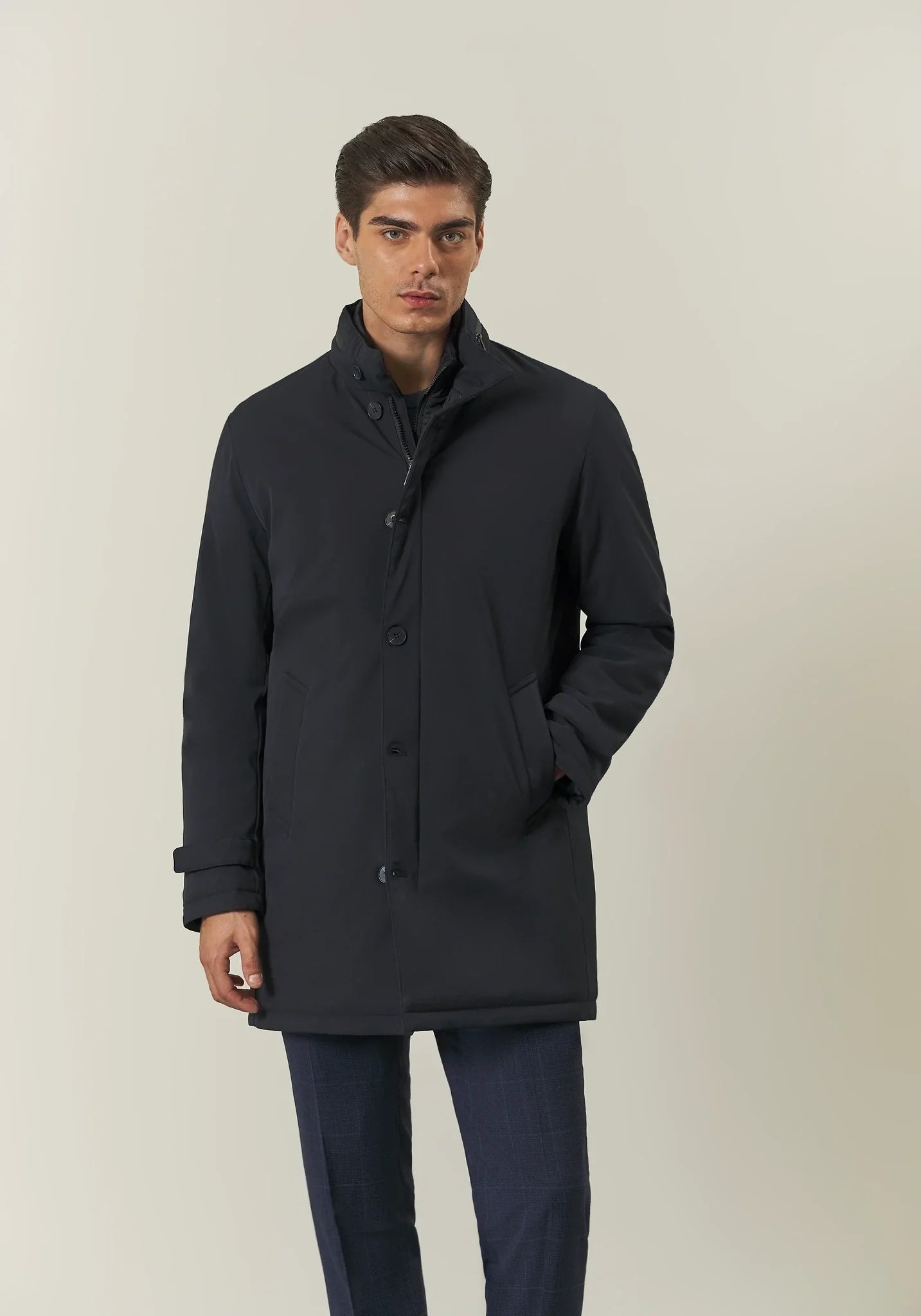 Blue waterproof technical coat with detachable bib