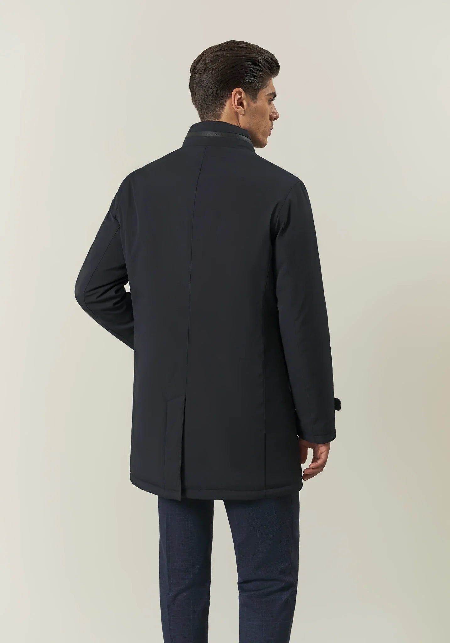 Blue waterproof technical coat with detachable bib