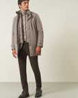 Waterproof sand technical coat with detachable bib