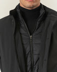 Black waterproof technical coat with detachable bib
