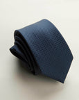 Blue tie with a white and light blue micro-pattern, silk