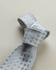 Light grey silk tie with light blue pattern