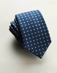 Blue silk tie with check pattern