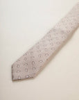 Beige silk tie with drop pattern