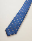Blue silk tie with dark brown drops pattern
