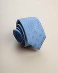 Light blue silk tie with drop pattern