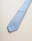 Light blue tie with brown micro-pattern silk