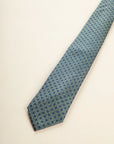 Green tie with blue polka dots, cotton and silk