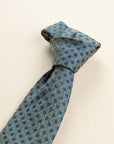 Green tie with blue polka dots, cotton and silk