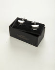 Curved black stone cufflink