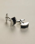 Curved black stone cufflink