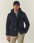 Technical blue jacket with hood and bib