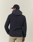 Technical blue jacket with hood and bib