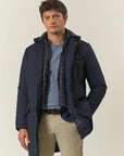 Long blue jacket with removable hood and bib