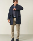Long blue jacket with removable hood and bib